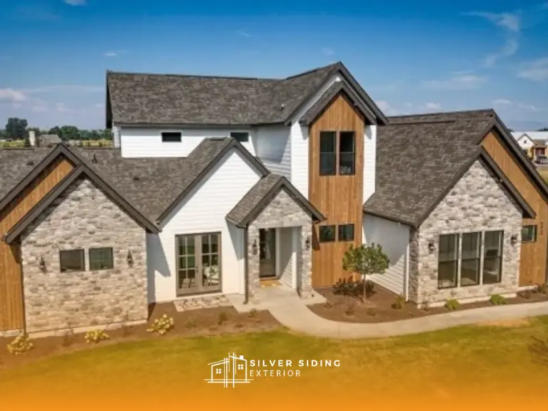 Top 8 Modern Home Siding Trends In 2026 3 mixed material house exterior modern wood and stone siding