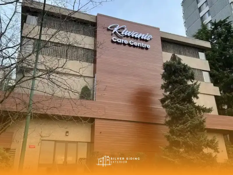 LUX Panels vs. Other Metal Siding: What's the Real Difference? 1 Longboard extruded aluminum siding with a woodgrain finish installed on a commercial building facade